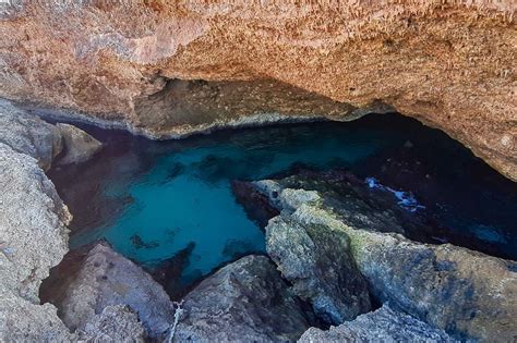 cave pool aruba photos Aruba UTV Tour with Natural Cave Pool and Cliff Jumping (From $121